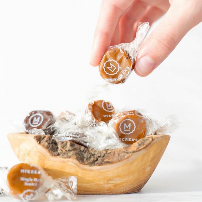 McCrea's Caramels Tapped Maple candy in a clear wrapper, showcasing rich caramel and maple flavor details.