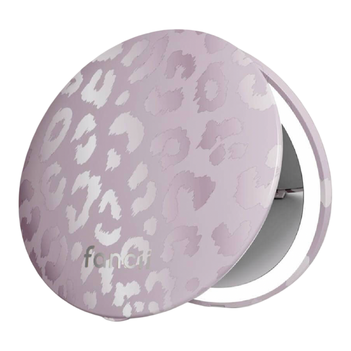 Round makeup mirror with leopard print design and 'fancii' branding on a white background