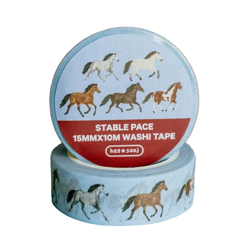 Decorative washi tape featuring running horses on blue design by hey ✿ sooj, perfect for crafts and journaling.