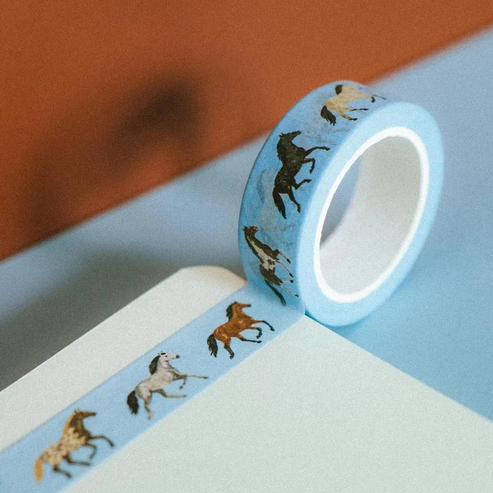 Decorative blue washi tape featuring running horses design by hey ✿ sooj, perfect for crafts and gift wrapping.