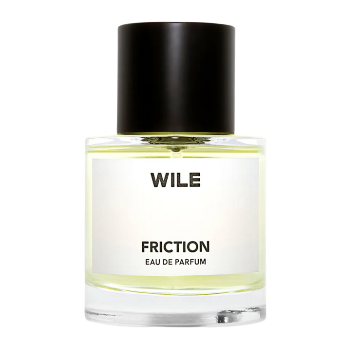 WILE Friction fragrance bottle, a bold underground club-inspired perfume with black leather and menthol notes.